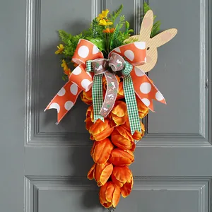 Handmade Easter tulip carrot wreath with decorative orange polka dot bow on door