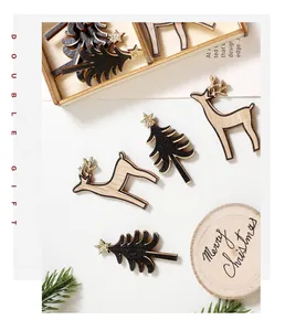 Close-up of wooden reindeer and Christmas tree ornaments with gold glitter details