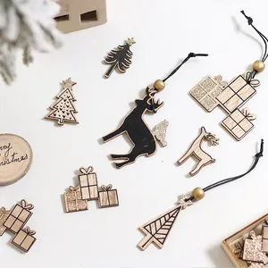 Festive wooden Christmas ornaments set featuring reindeer, trees and glitter gift boxes