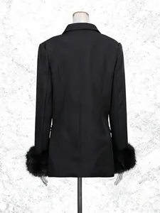 Elegant black suit jacket for women featuring luxurious faux fur cuffs back view
