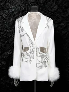 Elegant white luxury blazer featuring rhinestone patterns, waist cut-outs and faux fur cuffs