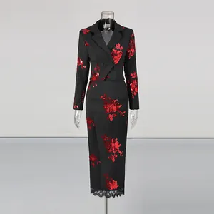 Elegant black two-piece set featuring red floral sequins with blazer and lace-trim skirt.