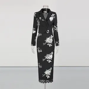 Close-up of the silver floral sequin patterns and delicate lace trim on the black set