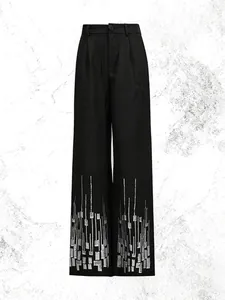 Elegant black high-waist straight-leg trousers with silver sequin geometric hem patterns