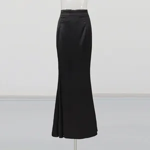 Elegant high-waisted black satin mermaid maxi skirt with a sophisticated fishtail silhouette