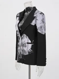 Elegant women's black blazer featuring a large grey floral print and stylish V-neck collar