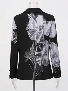 Professional black commuter blazer featuring a large white artistic floral print on the back