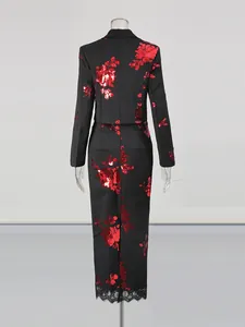 Elegant two-piece set featuring red floral sequins on a black cropped blazer and lace skirt.