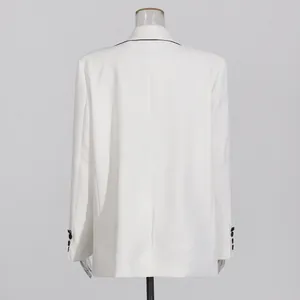 Back view of an elegant white women's blazer featuring black piping and buttoned cuffs
