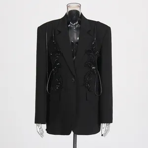 Black women's blazer featuring sequined butterfly appliqués and a single button.