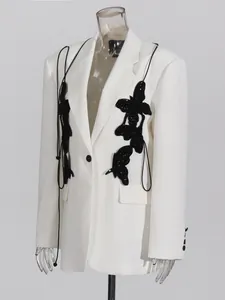 Elegant white women's blazer with black sequin butterfly accents and single button