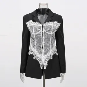 Detailed front view of black blazer with elegant white lace corset patchwork design.