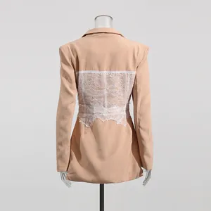 Back view of apricot blazer featuring elegant white lace patchwork and corset waist