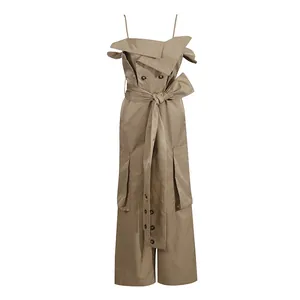 Front view of khaki spaghetti strap jumpsuit with off-shoulder draped collar and bow belt.