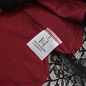 Close-up of garment care label showing 98% polyester and 2% spandex fabric composition