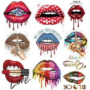 Detailed view of various colorful lip heat transfer patches for DIY t-shirt designs
