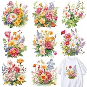 Detailed view of vintage floral heat transfer patches for custom clothing DIY projects.