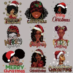 Detailed view of nine Christmas heat transfer stickers featuring black girls in festive Santa hats