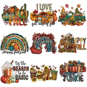 Detailed view of 9 autumn-themed heat transfer patches with pumpkins and sunflowers.