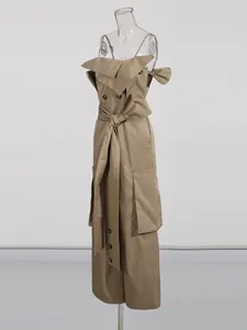 Elegant khaki spaghetti strap tube top jumpsuit with wide-leg pants on clear mannequin