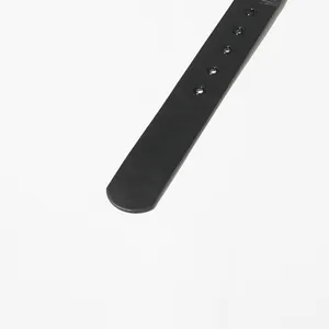 Close-up detail view of the premium black leather belt accessory for a luxury blazer dress