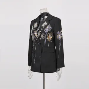 Side view of elegant black blazer with retro firework sequin embroidery detail