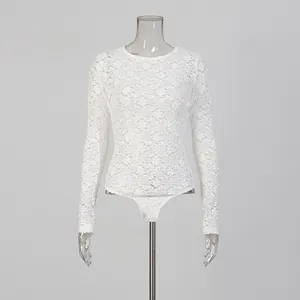 Front view of a white floral lace long-sleeve bodysuit on a transparent mannequin
