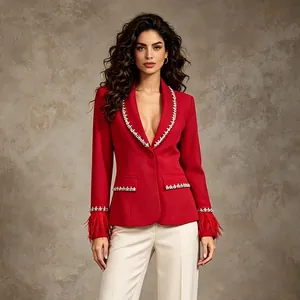 Elegant red blazer with crystal trim and feather cuffs for a luxury French look