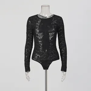Close-up view of a sexy black sheer lace bodysuit featuring intricate floral patterns