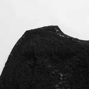 Close-up detail of sexy black floral lace patchwork on women's perspective bodysuit garment