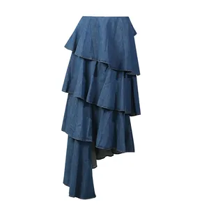 High-quality detailed view of retro layered tiered denim skirt with asymmetrical hemline