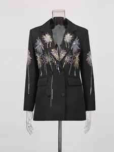 Elegant black blazer with detailed golden firework embroidery and cinched waist design