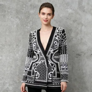 Detailed view of luxury palace style blazer featuring heavy beadwork and embroidery