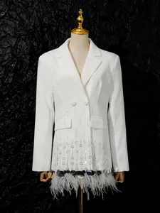Elegant white blazer featuring ostrich feather trim and shell sequin patchwork detail