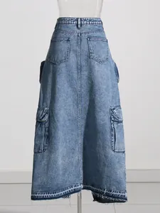 Stylish light blue high waist denim A-line skirt with cargo pockets and raw hem