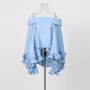 Light blue off-the-shoulder French resort style top with ruffled hem detail on mannequin