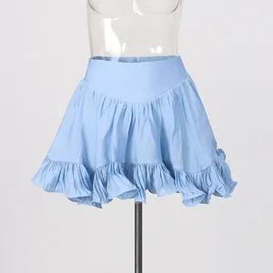 Detail view of light blue mini skirt with feminine ruffle hem for summer.