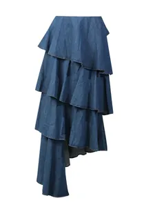 Elegant vintage tiered denim maxi skirt featuring an asymmetrical ruffled hem design