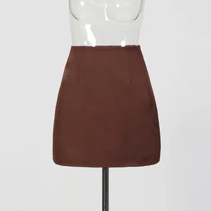 Front view of a brown high-waist hip-wrapping mini skirt on a mannequin