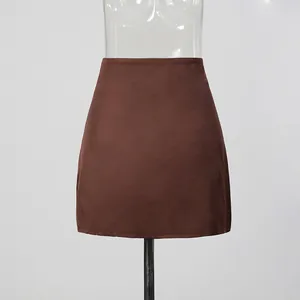 High-waisted brown mini skirt shown on a transparent female torso mannequin stand