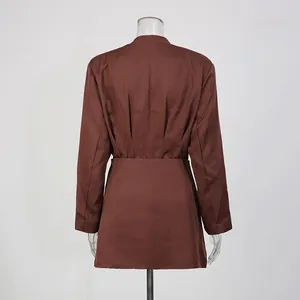 Back view detail of brown elegant waist-cinching blazer and mini skirt two-piece set