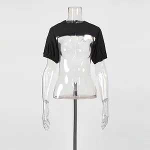 Detailed view of a chic black puff sleeve shrug displayed on a transparent mannequin