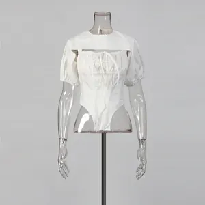 Detail view of white puff sleeve bolero and drawstring camisole bodysuit set