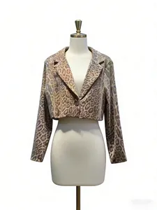 Detail view of retro leopard print sequin cropped blazer featuring a single button lapel