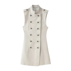 Front view of apricot stand collar sleeveless A-line vest dress with button details.