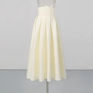 Detail of cream French vintage high waisted pleated midi skirt with wide waistband