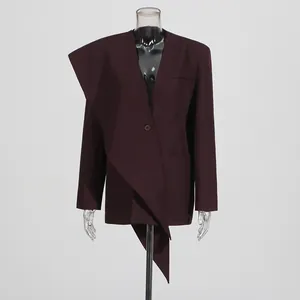 Detailed view of burgundy asymmetric scarf-collar blazer for women in elegant style.