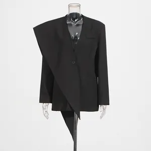 Detail view of women's black loose blazer featuring a unique oversized scarf collar