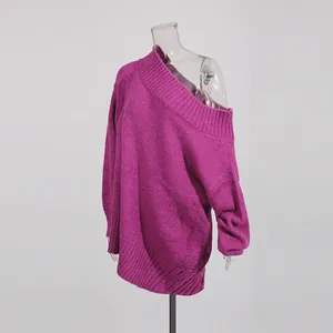 Detailed view of a purple off-the-shoulder loose knit sweater displayed on a mannequin
