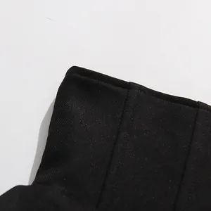Close-up detail of black textured twill fabric for vintage French style women's set
